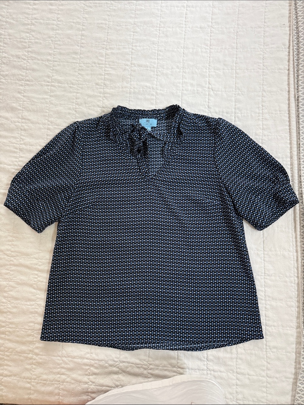 Printed top with bow neck